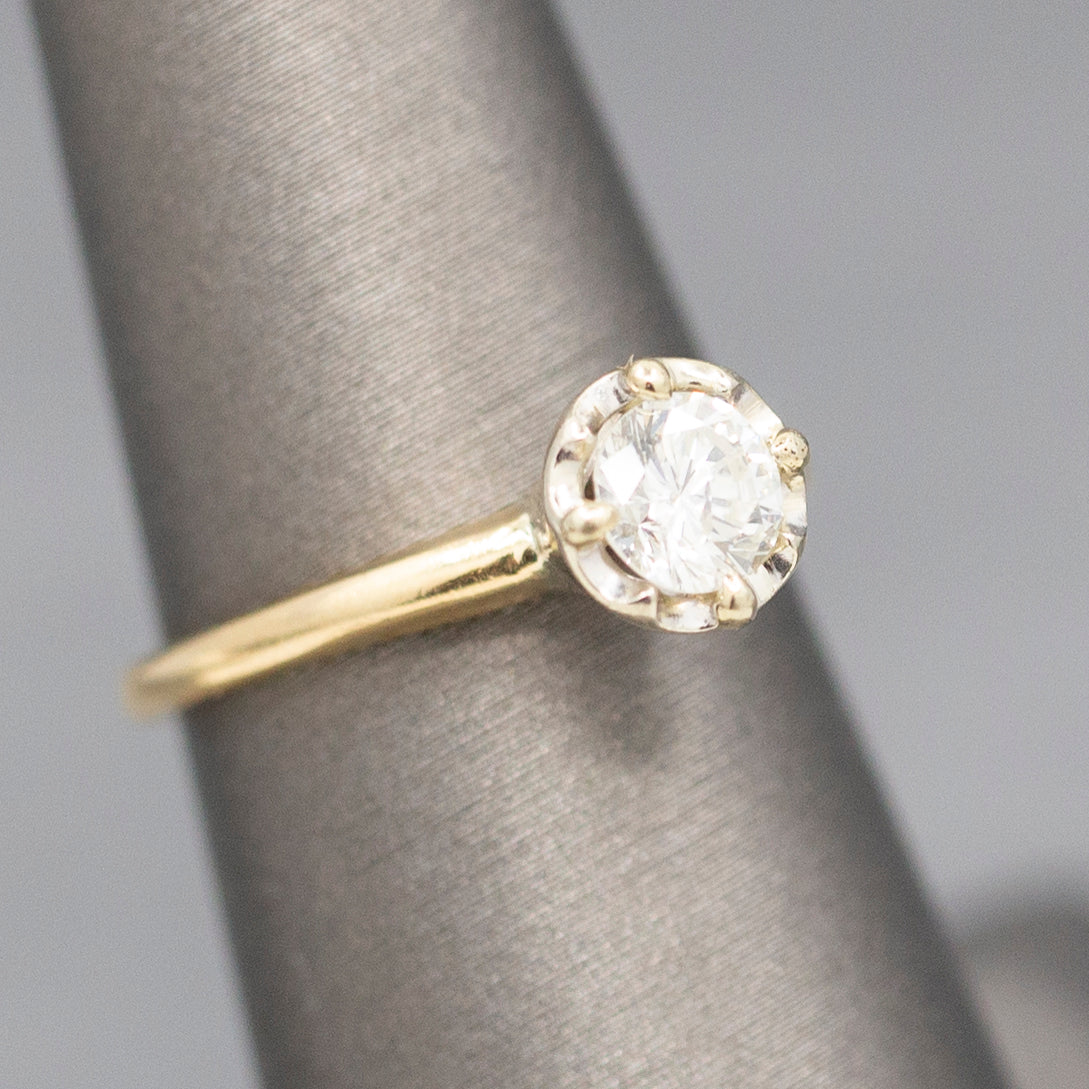 Feminine Round Brilliant Cut Diamond Solitaire Engagement Ring with Illusion Head in 14k Yellow Gold