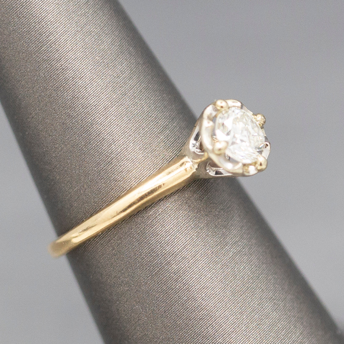 Feminine Round Brilliant Cut Diamond Solitaire Engagement Ring with Illusion Head in 14k Yellow Gold