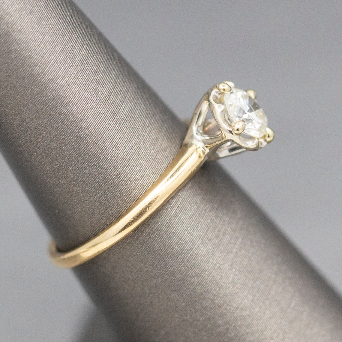 Feminine Round Brilliant Cut Diamond Solitaire Engagement Ring with Illusion Head in 14k Yellow Gold
