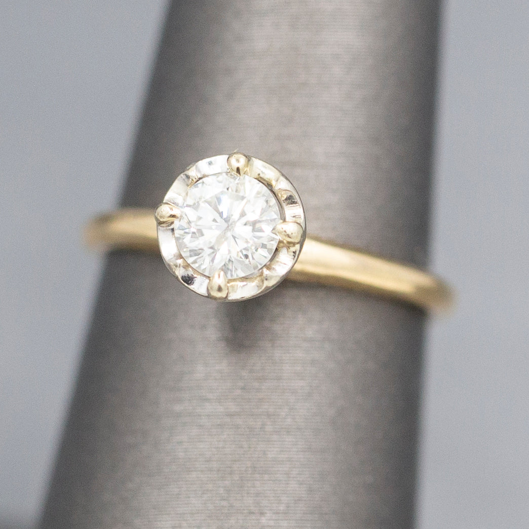 Feminine Round Brilliant Cut Diamond Solitaire Engagement Ring with Illusion Head in 14k Yellow Gold