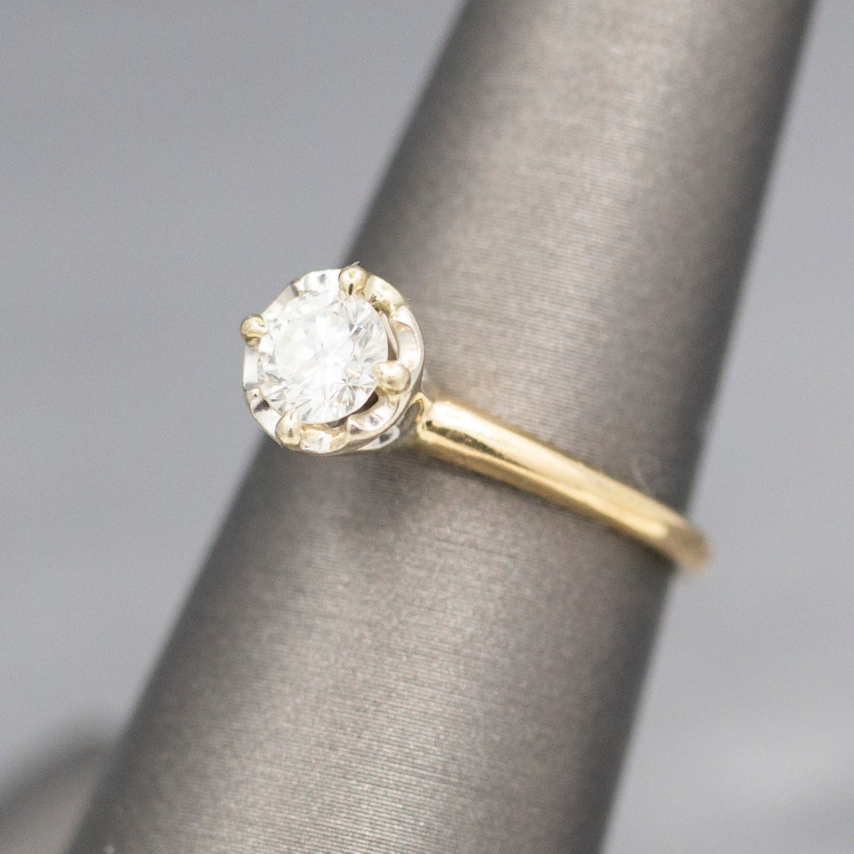 Feminine Round Brilliant Cut Diamond Solitaire Engagement Ring with Illusion Head in 14k Yellow Gold