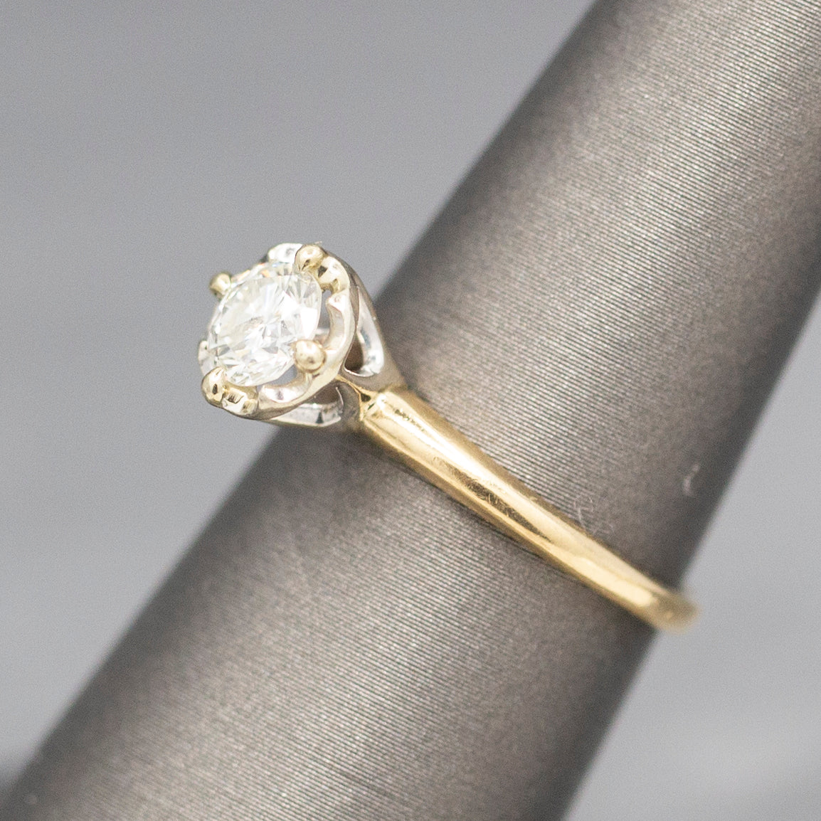 Feminine Round Brilliant Cut Diamond Solitaire Engagement Ring with Illusion Head in 14k Yellow Gold