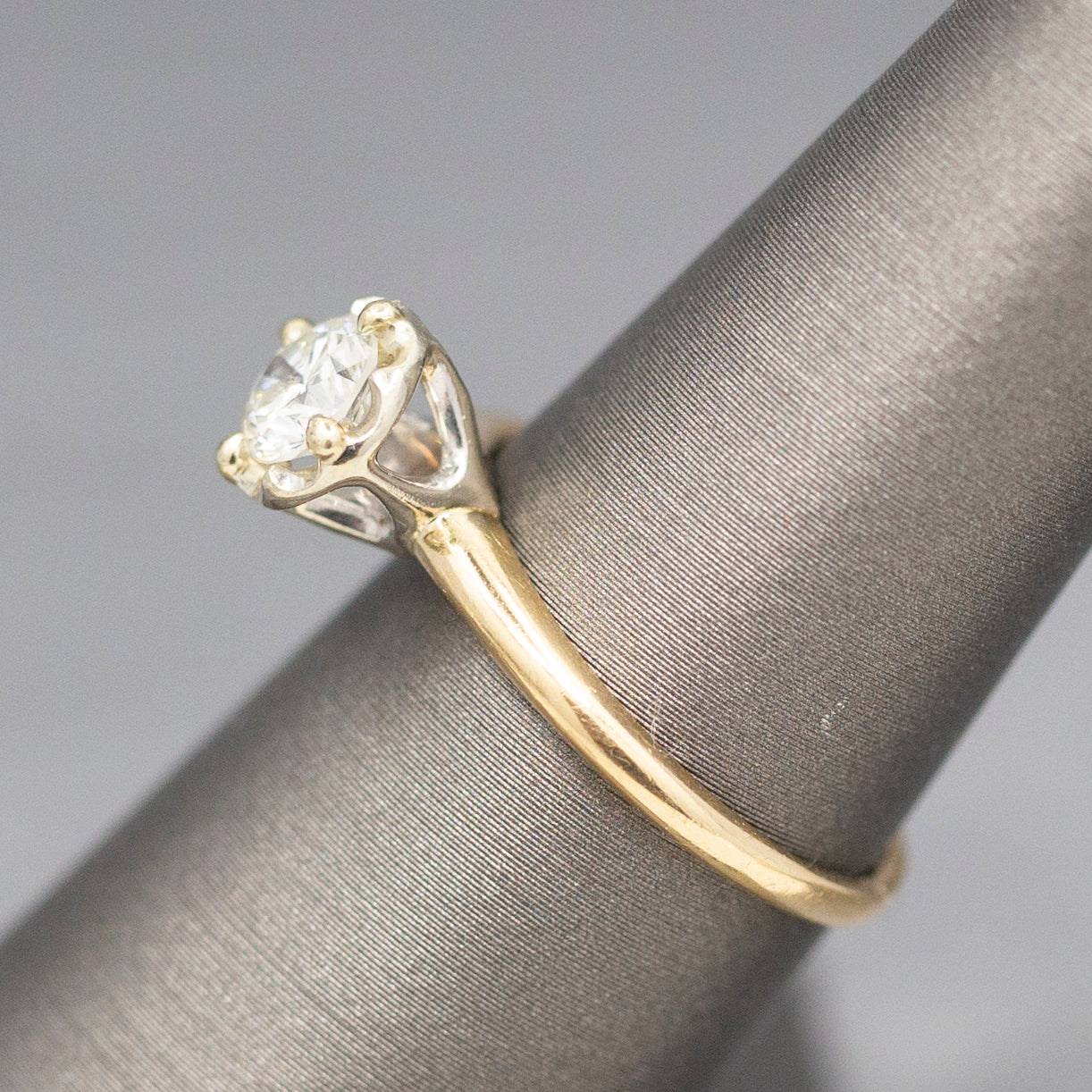 Feminine Round Brilliant Cut Diamond Solitaire Engagement Ring with Illusion Head in 14k Yellow Gold