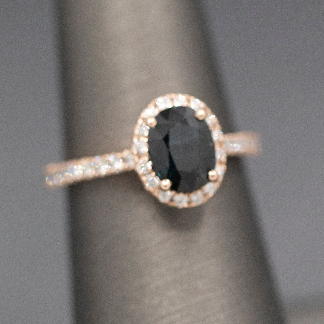Handcrafted Deep Blue Oval Sapphire and Diamond Halo Ring in 14k Rose Gold