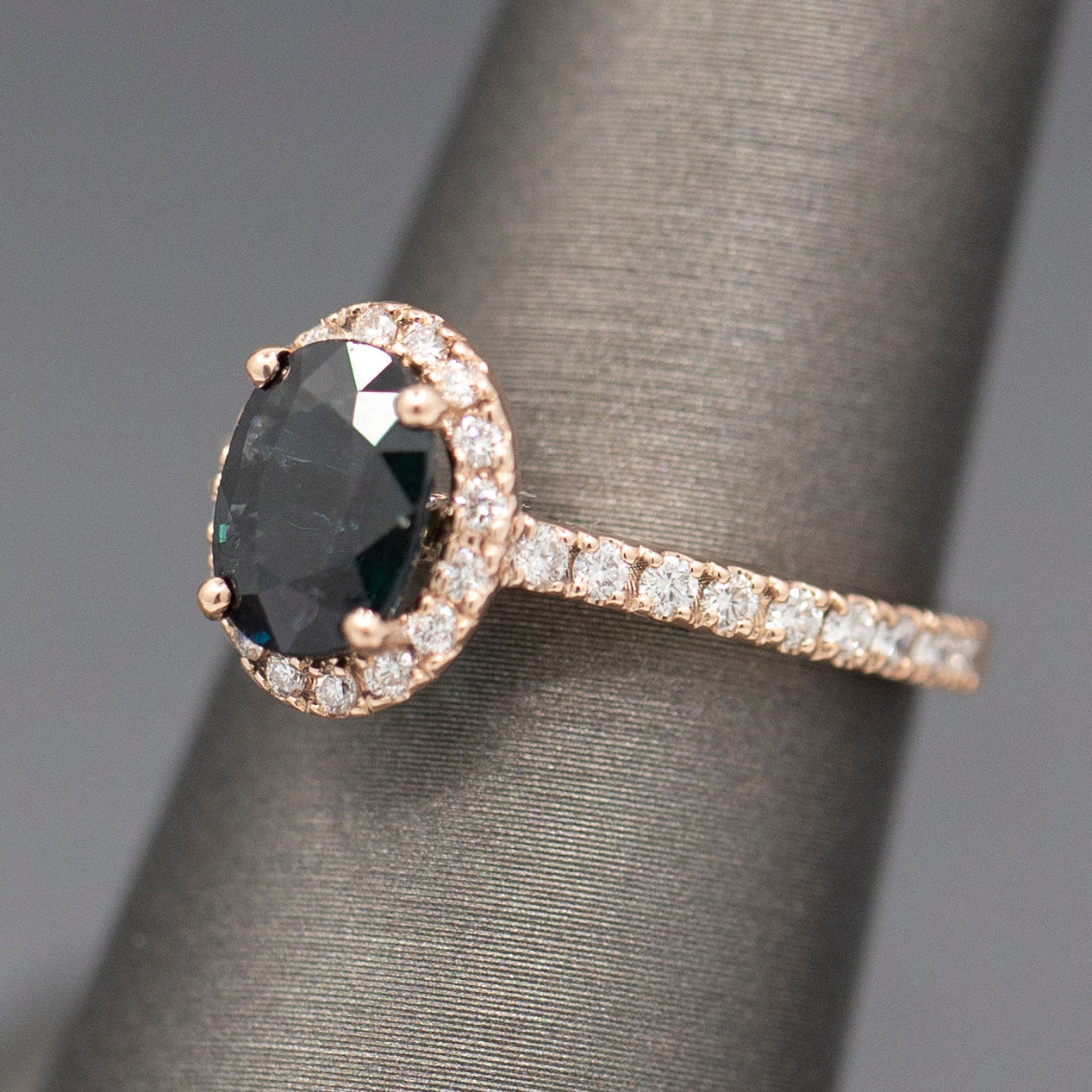 Handcrafted Deep Blue Oval Sapphire and Diamond Halo Ring in 14k Rose Gold