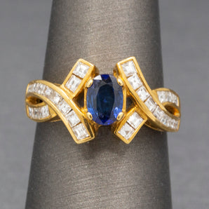 Sparkling Oval Cut Blue Sapphire and French Cut Carre' Diamond Ring in 18k Yellow Gold