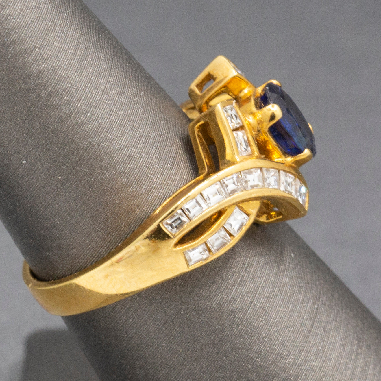 Sparkling Oval Cut Blue Sapphire and French Cut Carre' Diamond Ring in 18k Yellow Gold