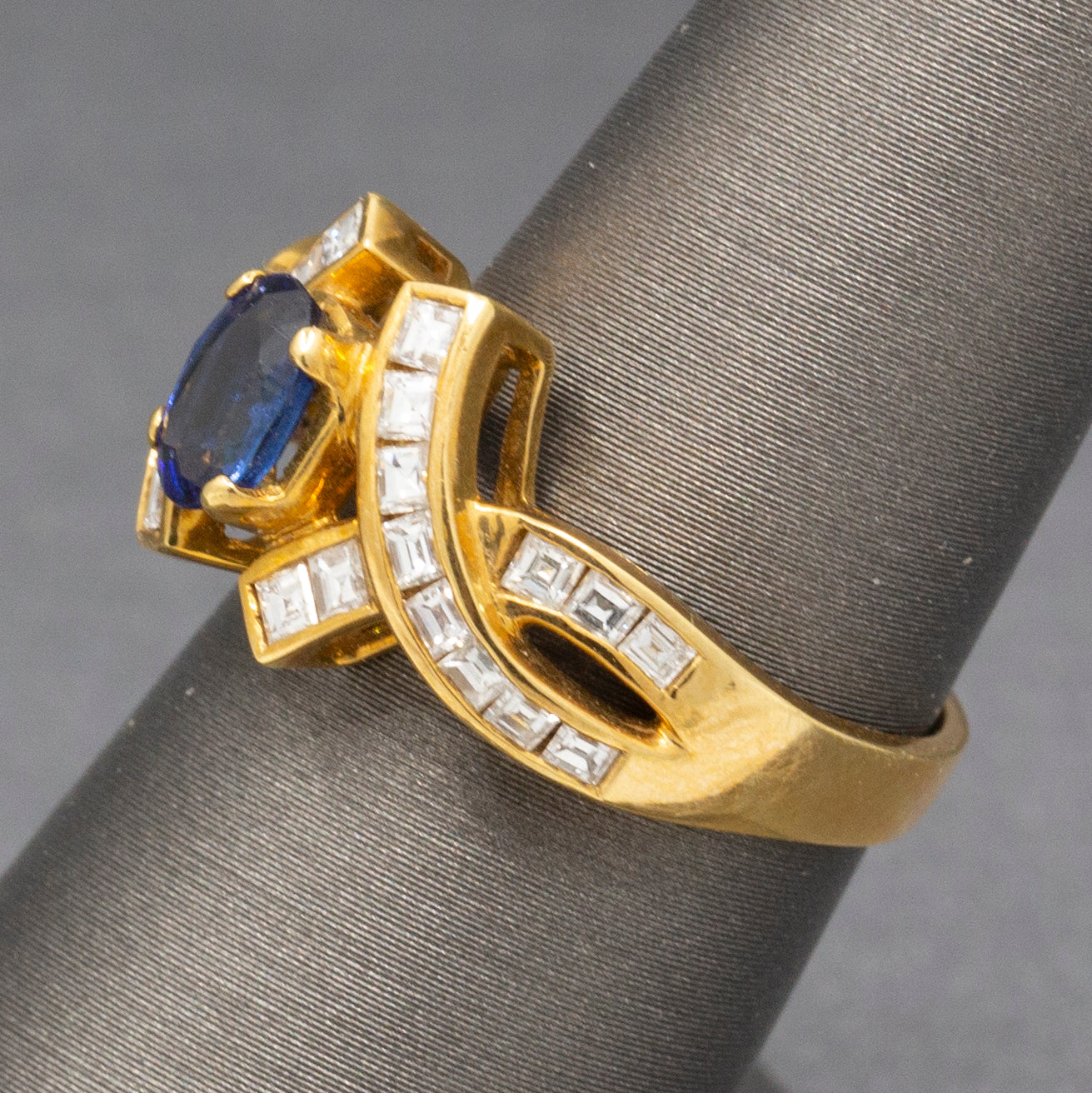 Sparkling Oval Cut Blue Sapphire and French Cut Carre' Diamond Ring in 18k Yellow Gold
